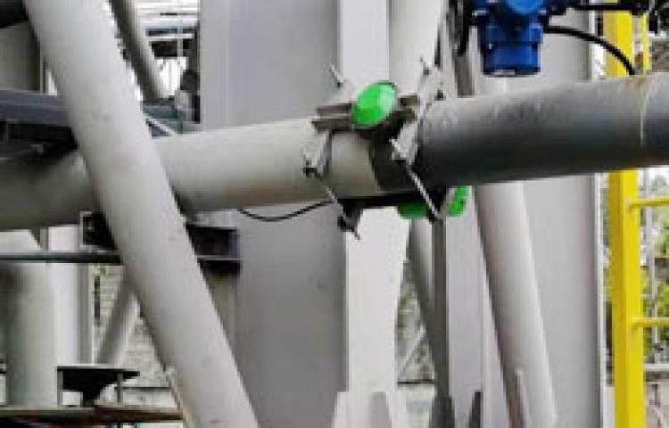 Na-22 radioactive instrument measurement of slurry pipe concentration in mine filling station